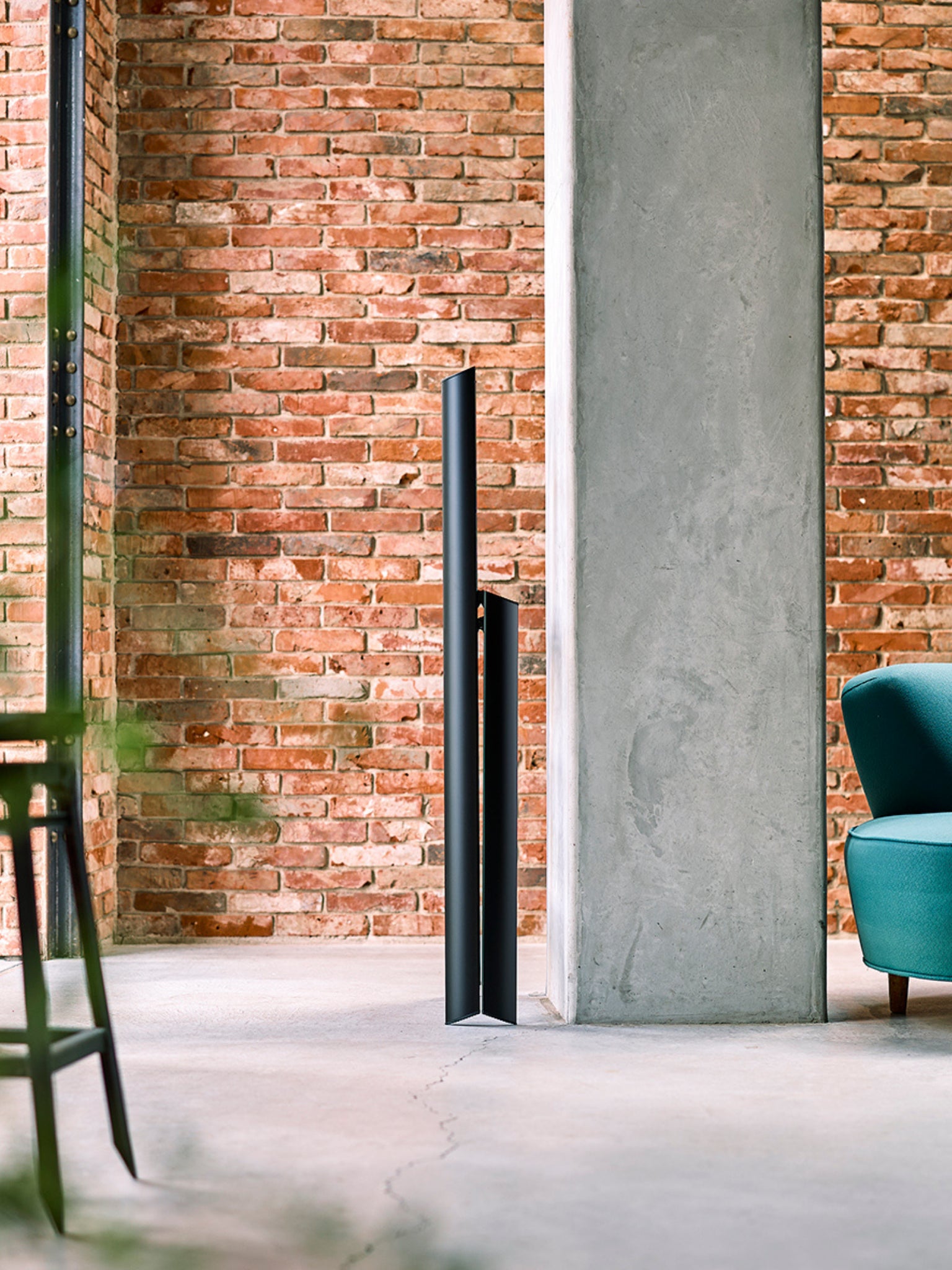 opgevouwen lucano 3 step ladder tegen de muur